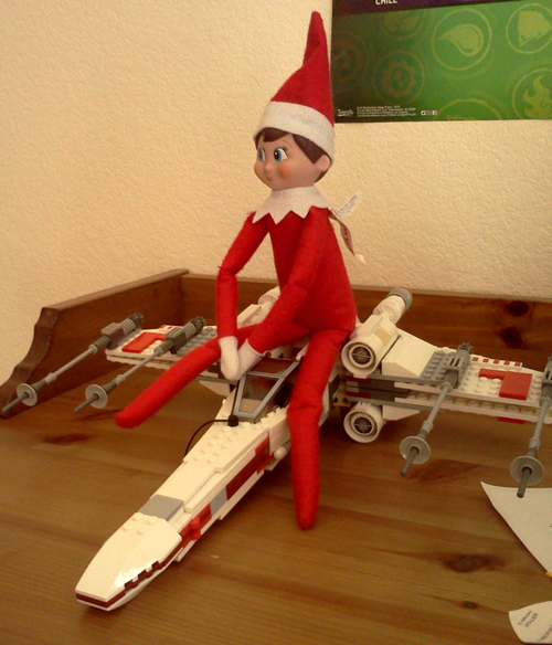 Wink rides a Lego Star Wars X-wing fighter